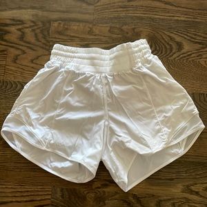 Never been worn white Lulu lemon athletic shorts. Size 2.